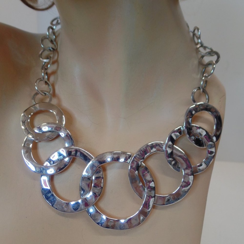 Silvertone Bib Circular Necklace Adjustable to 16"  Brand is Stamped HH